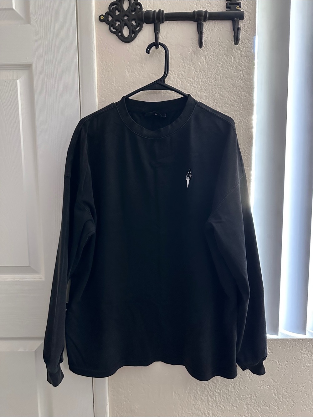 Men's Black Long-Sleeve Crewneck with Minimalist Chest Logo